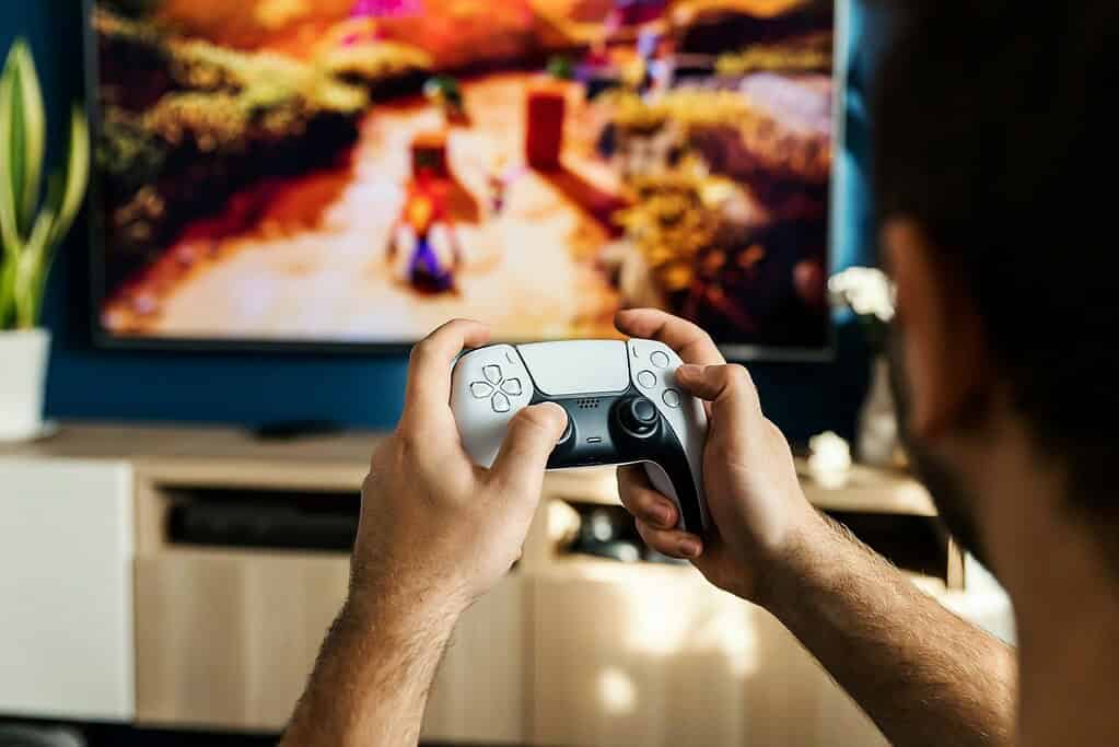 a man playing a video game on the nintendo wii
